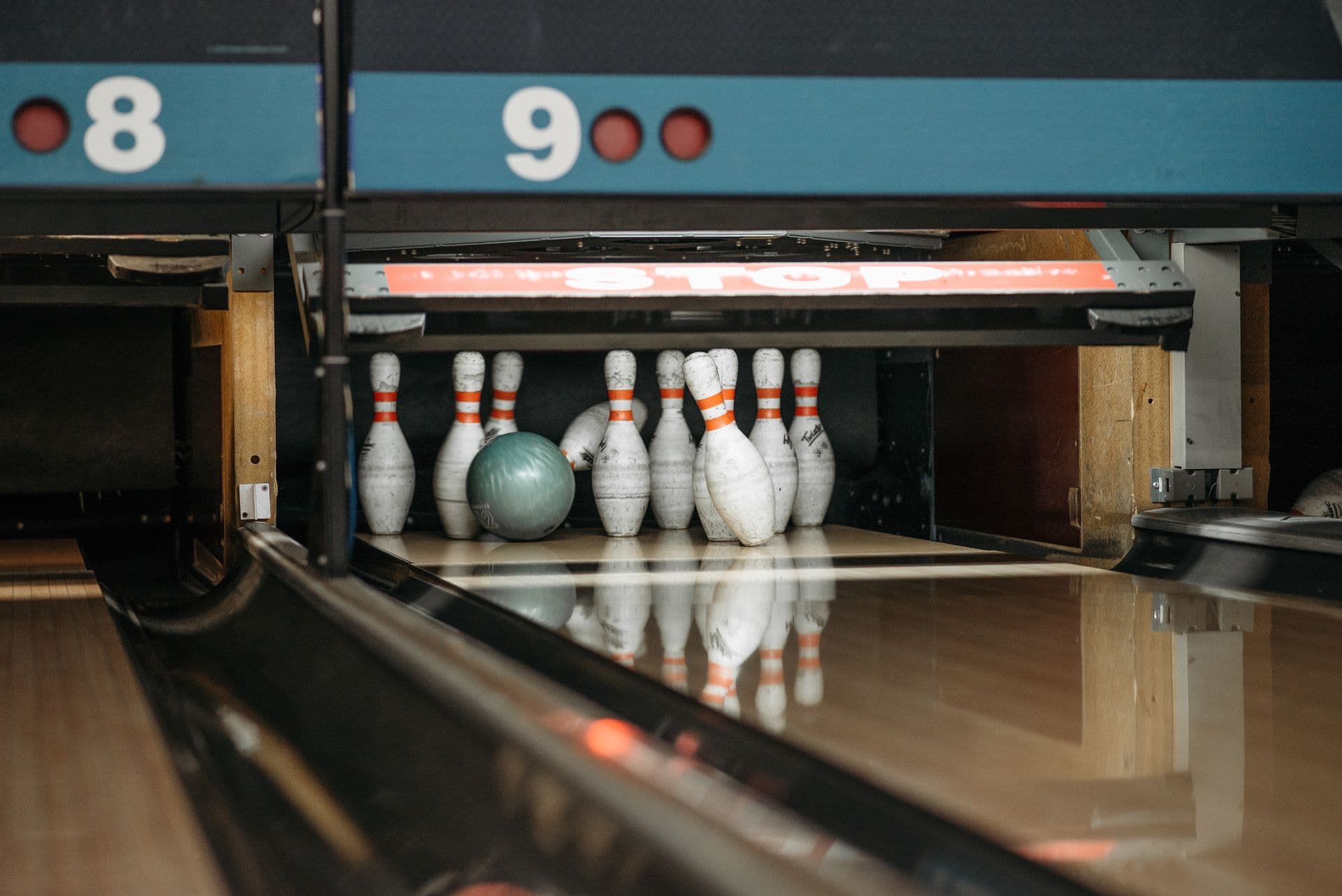 Bowling ball hitting the pins