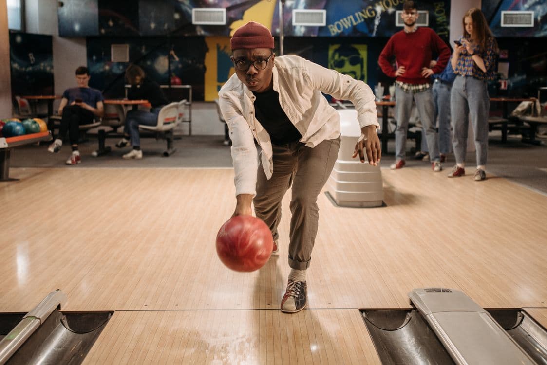 Friends enjoying a game at State Street Lanes