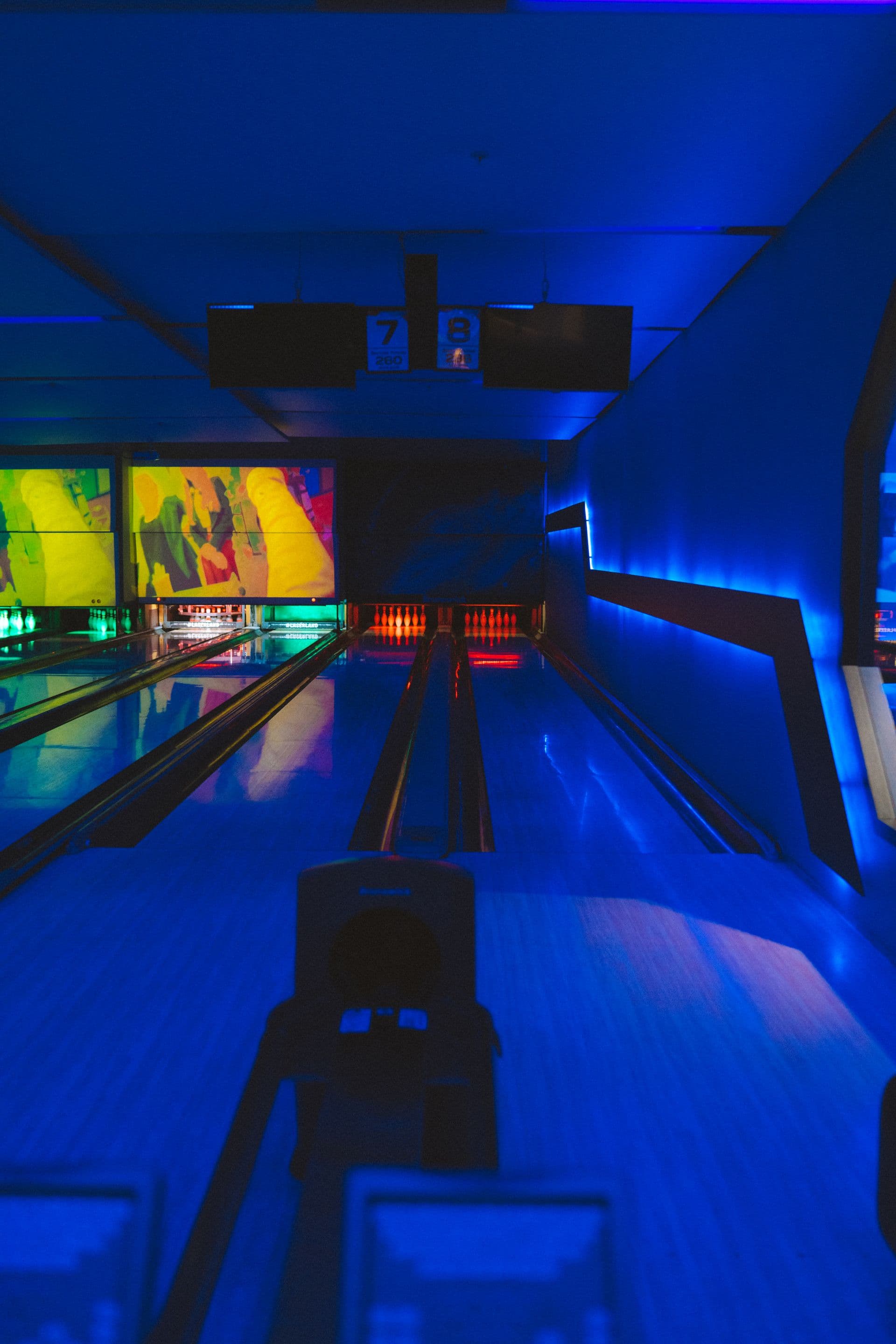 Friends bowling together