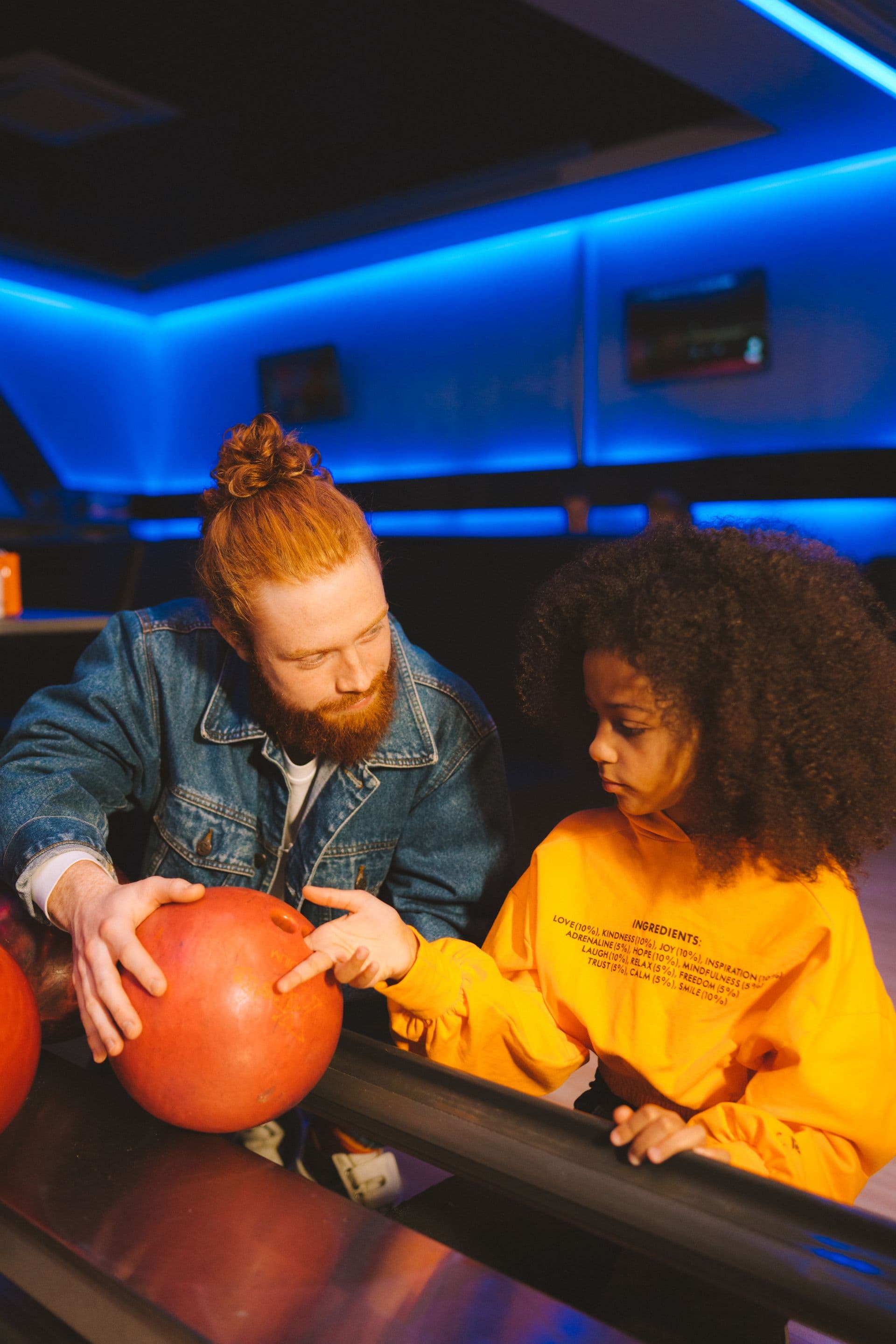 Young bowler celebrating a strike